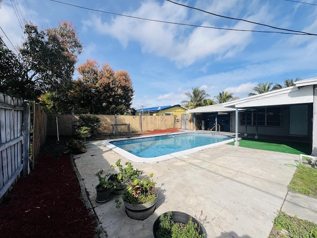 view of pool with a patio