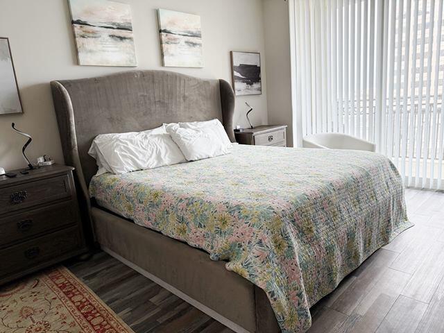 bedroom featuring wood-type flooring