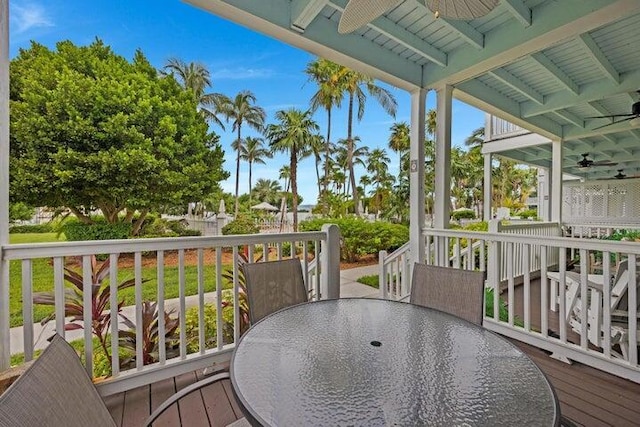 wooden deck with ceiling fan