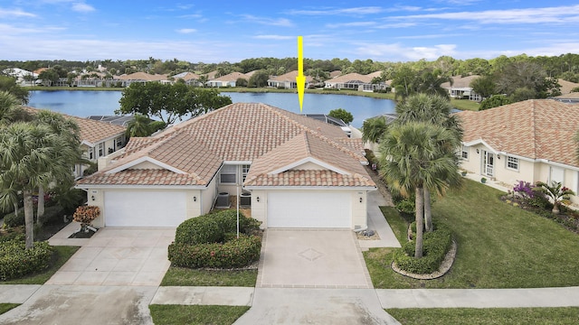 bird's eye view with a water view