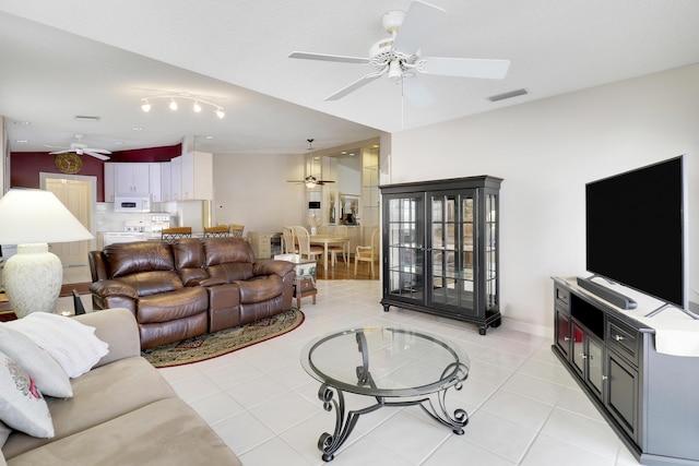 living room featuring light tile patterned flooring