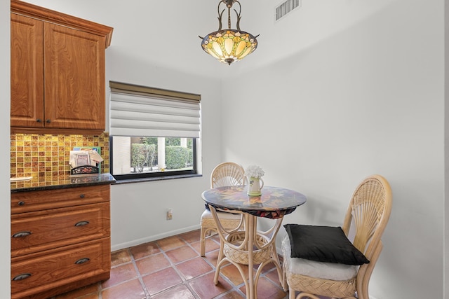 view of tiled dining space