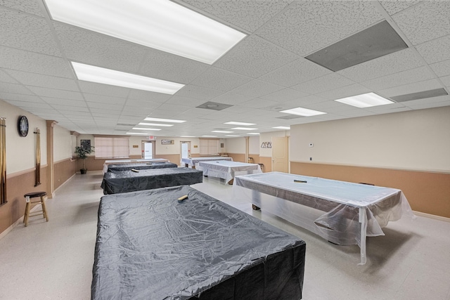 recreation room with a paneled ceiling and pool table