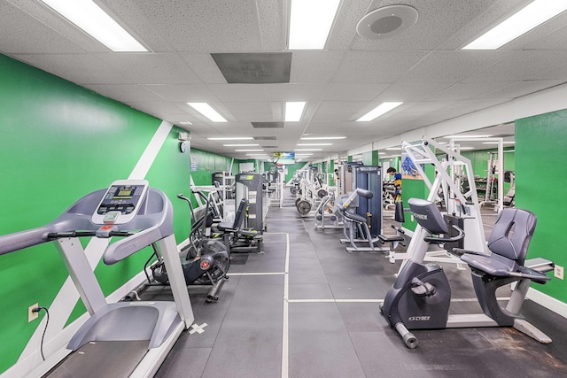 workout area with a drop ceiling