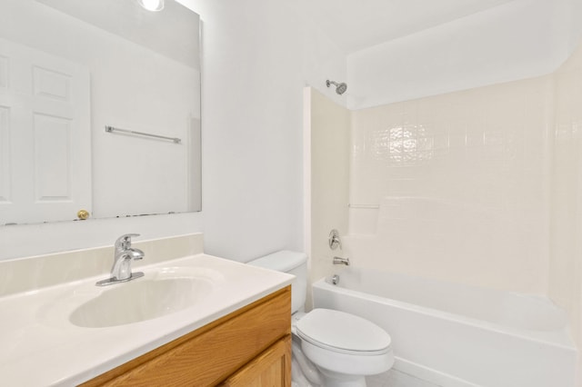 full bathroom with vanity, shower / bathtub combination, and toilet