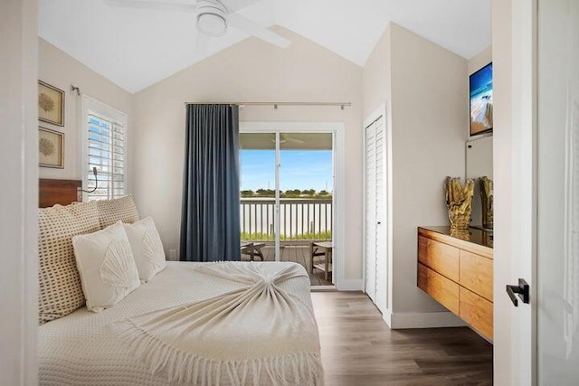 bedroom with ceiling fan, access to exterior, multiple windows, and wood-type flooring