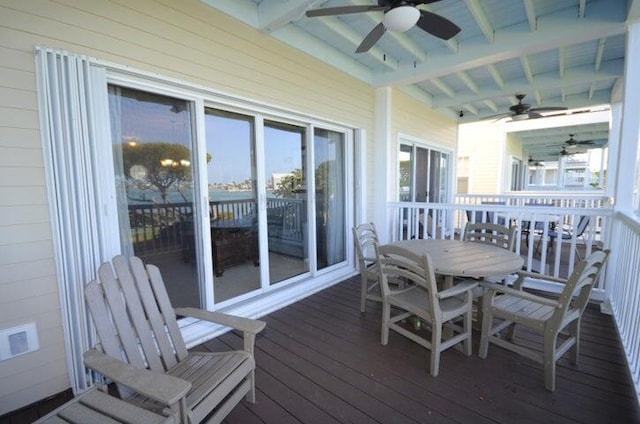 wooden deck with ceiling fan