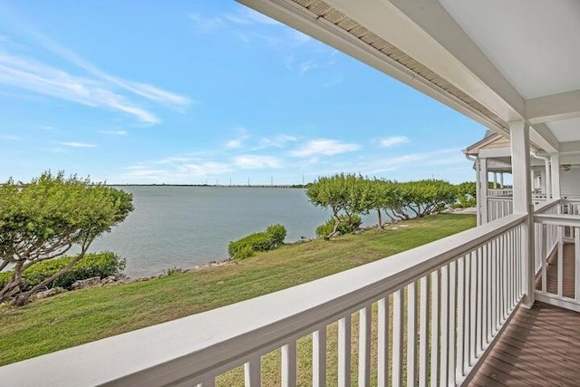 balcony featuring a water view