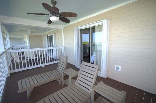 exterior space with ceiling fan