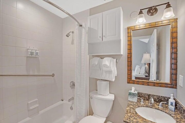 full bathroom featuring toilet, vanity, and shower / bath combo