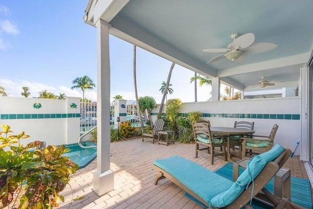 view of patio / terrace with ceiling fan