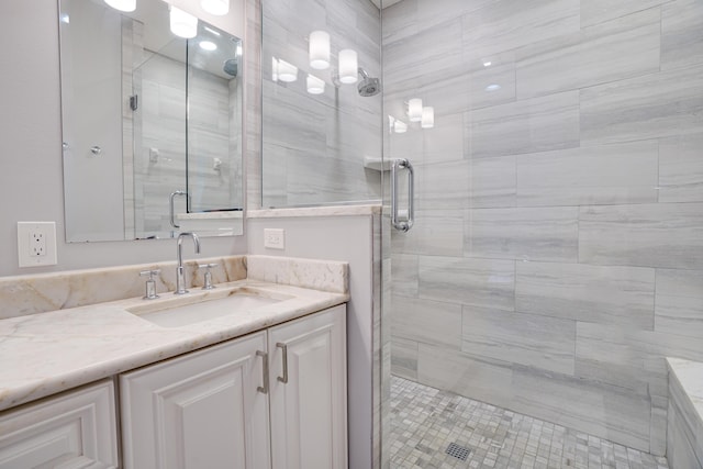 bathroom featuring vanity and walk in shower