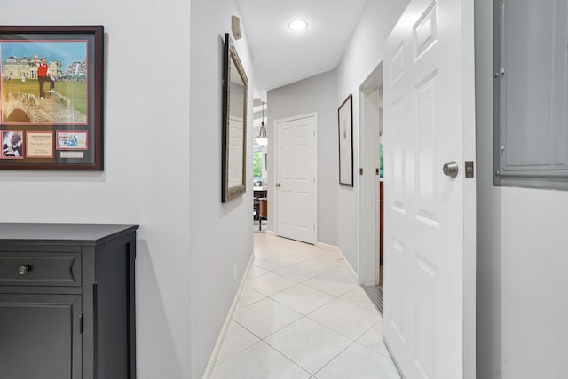 hall with light tile patterned flooring