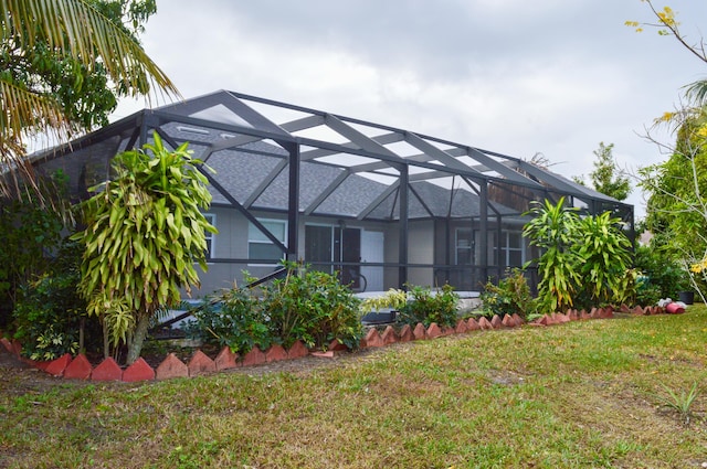 view of yard featuring a lanai