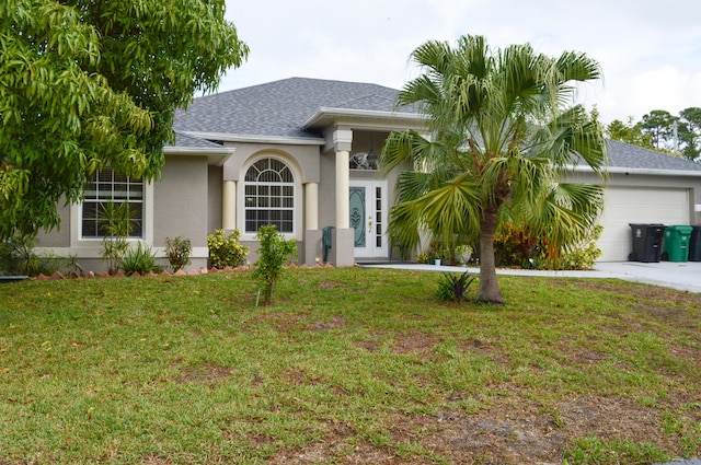 ranch-style house with a front lawn and a garage