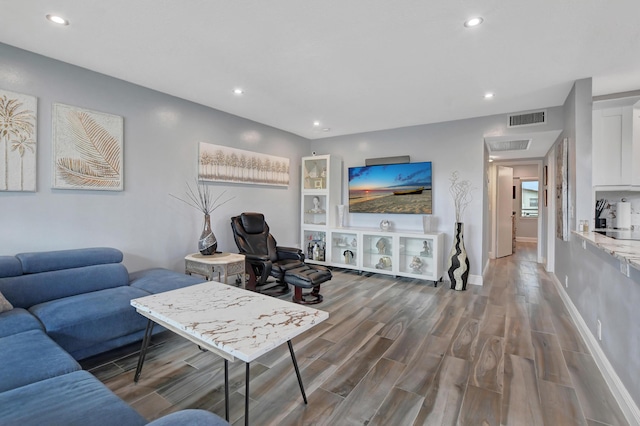 living room featuring dark hardwood / wood-style flooring