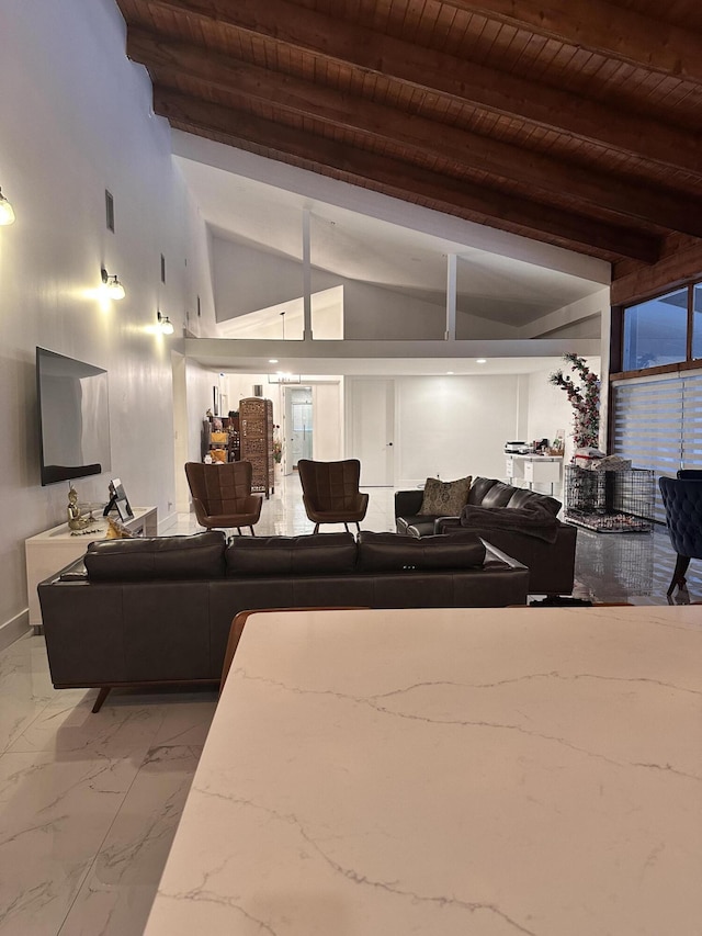 living area with visible vents, marble finish floor, wooden ceiling, and lofted ceiling with beams