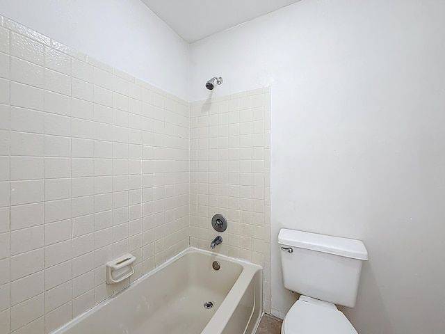 full bathroom featuring toilet and shower / tub combination