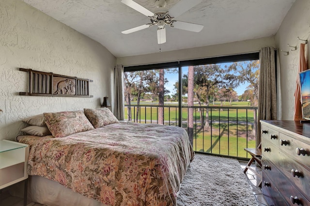 bedroom featuring ceiling fan and lofted ceiling