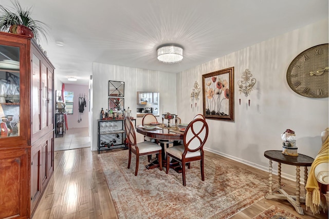 dining room featuring light hardwood / wood-style floors