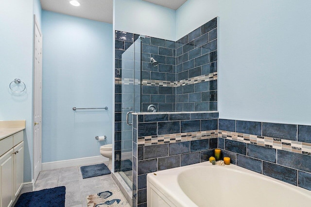 full bathroom featuring tile patterned floors, separate shower and tub, vanity, and toilet