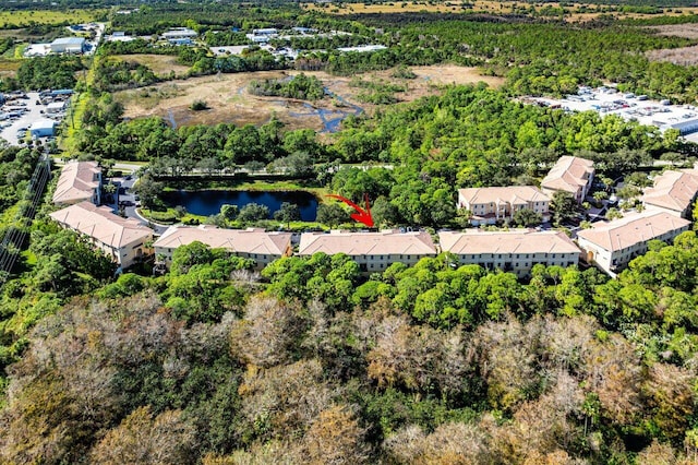 bird's eye view with a water view