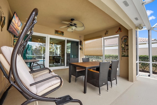 view of patio featuring ceiling fan