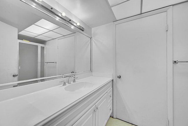 bathroom with vanity and an enclosed shower