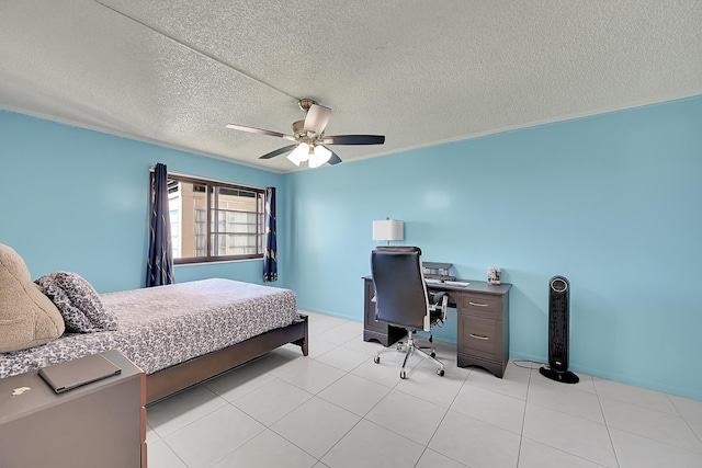 bedroom with a textured ceiling and ceiling fan