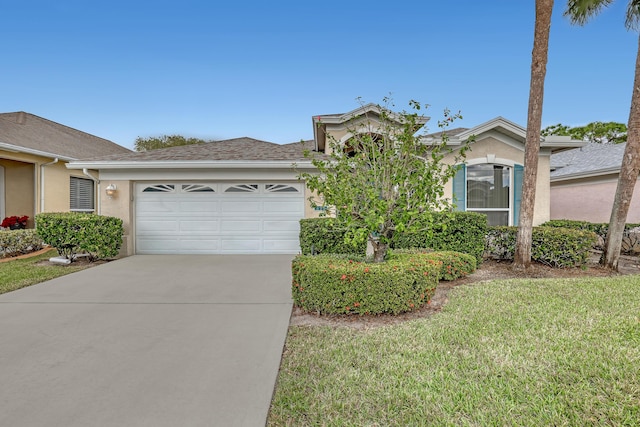 619 NW Monticello Pl NW, Port Saint Lucie, FL 34986 - view of front of home featuring stucco siding, a garage, driveway, a front yard, and a shingled roof