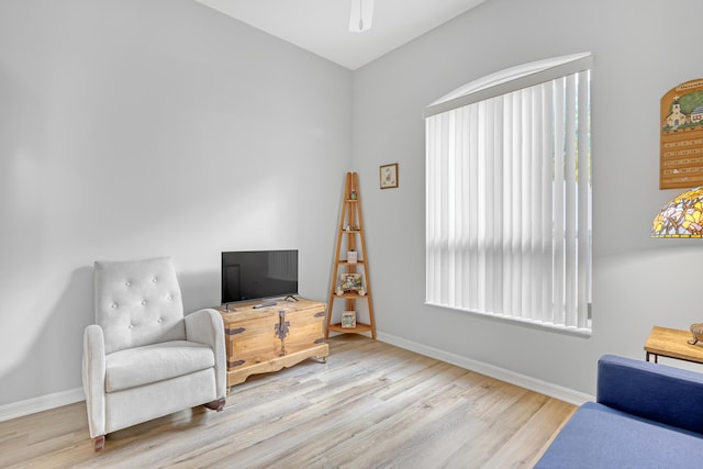 sitting room with light hardwood / wood-style floors