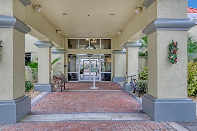 entrance to property featuring french doors