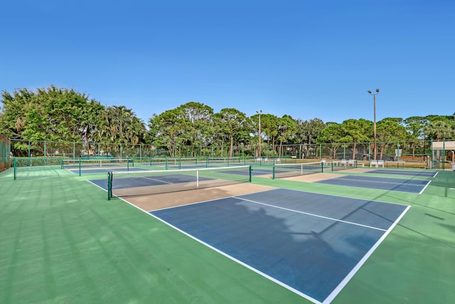 view of sport court with basketball hoop