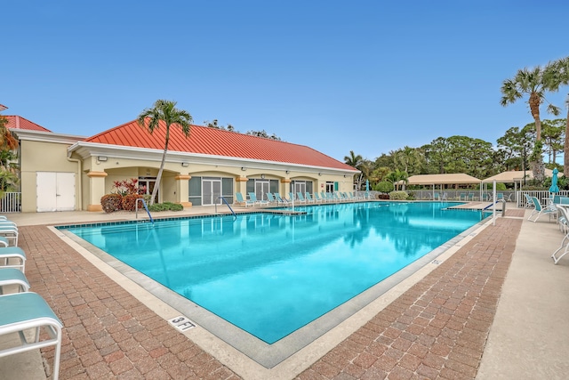 view of swimming pool featuring a patio