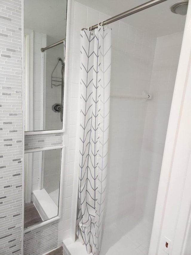 bathroom featuring curtained shower