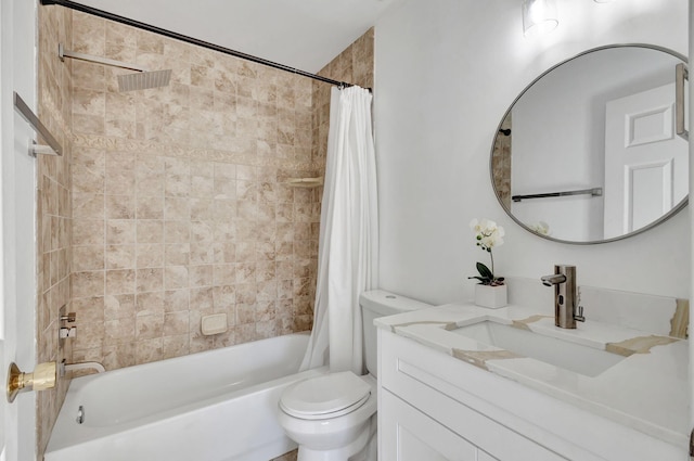 full bathroom featuring shower / bath combo, vanity, and toilet