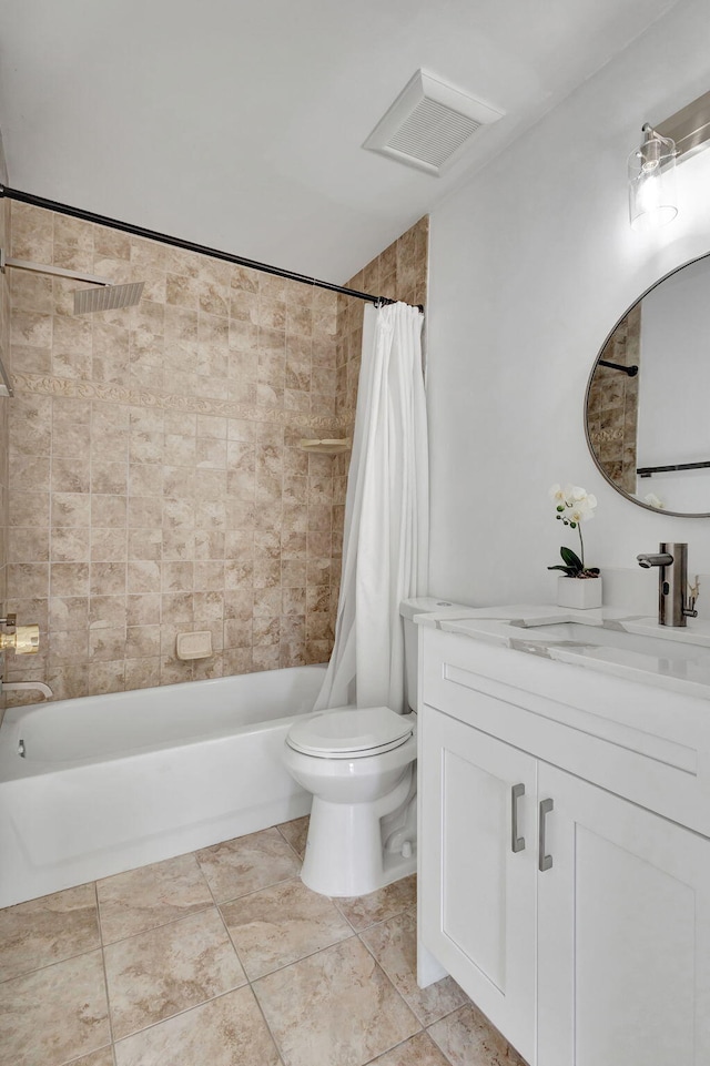 full bathroom with tile patterned flooring, vanity, shower / bath combination with curtain, and toilet