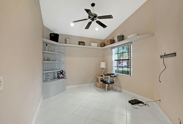 interior space featuring ceiling fan and lofted ceiling