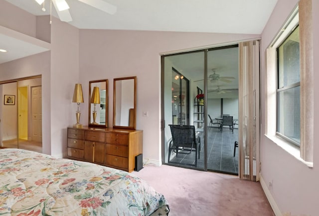 carpeted bedroom with ceiling fan, access to exterior, and lofted ceiling