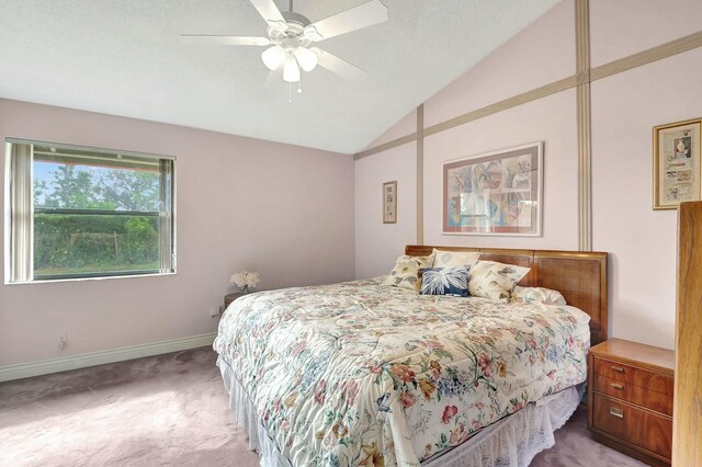7676 Lexington Club Blvd Unit A, Delray Beach, FL 33446 - carpeted bedroom featuring vaulted ceiling, baseboards, and ceiling fan