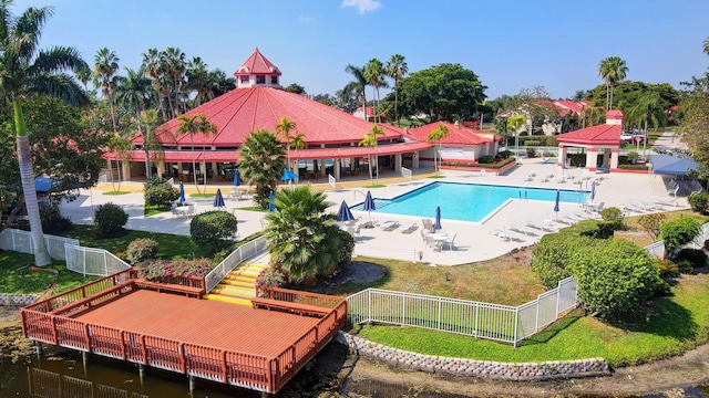 7676 Lexington Club Blvd Unit A, Delray Beach, FL 33446 - community pool featuring a fenced backyard and a patio area