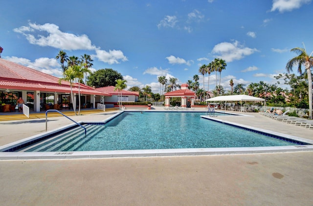 view of pool with a gazebo and a patio area