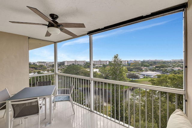 balcony featuring ceiling fan