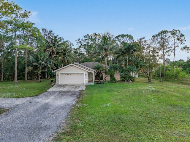 view of yard with a garage