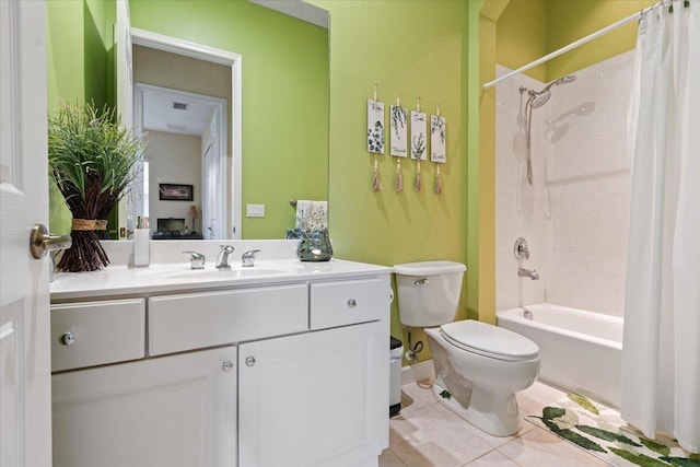 full bathroom with tile patterned flooring, vanity, toilet, and shower / bath combo with shower curtain