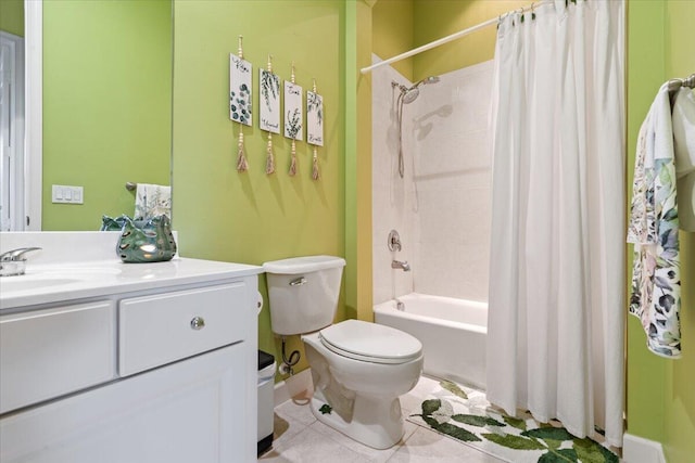 full bathroom featuring tile patterned floors, shower / bath combo with shower curtain, vanity, and toilet