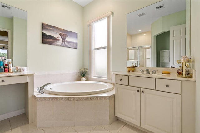 bathroom with tile patterned flooring, vanity, and plus walk in shower