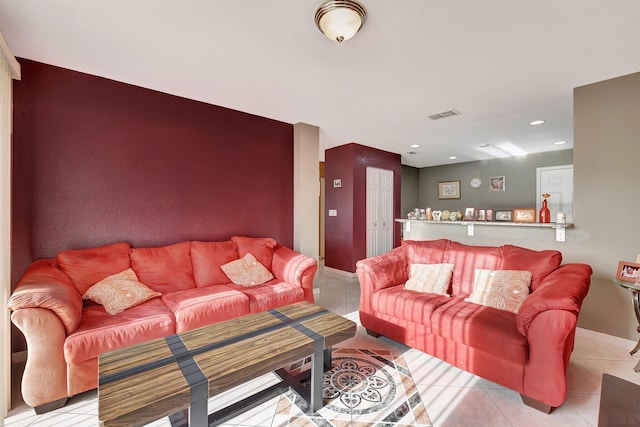 living room featuring light tile patterned floors