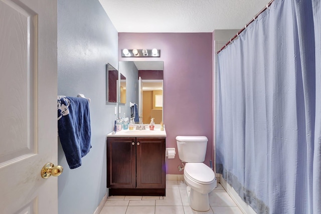 bathroom with tile patterned floors, vanity, curtained shower, and toilet