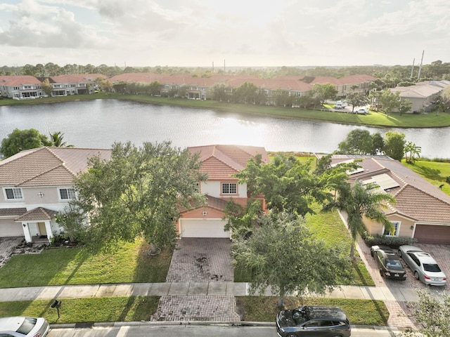 birds eye view of property featuring a water view